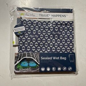 Itzy Ritzy Travel Happens Wet Bag - Geo Arrows